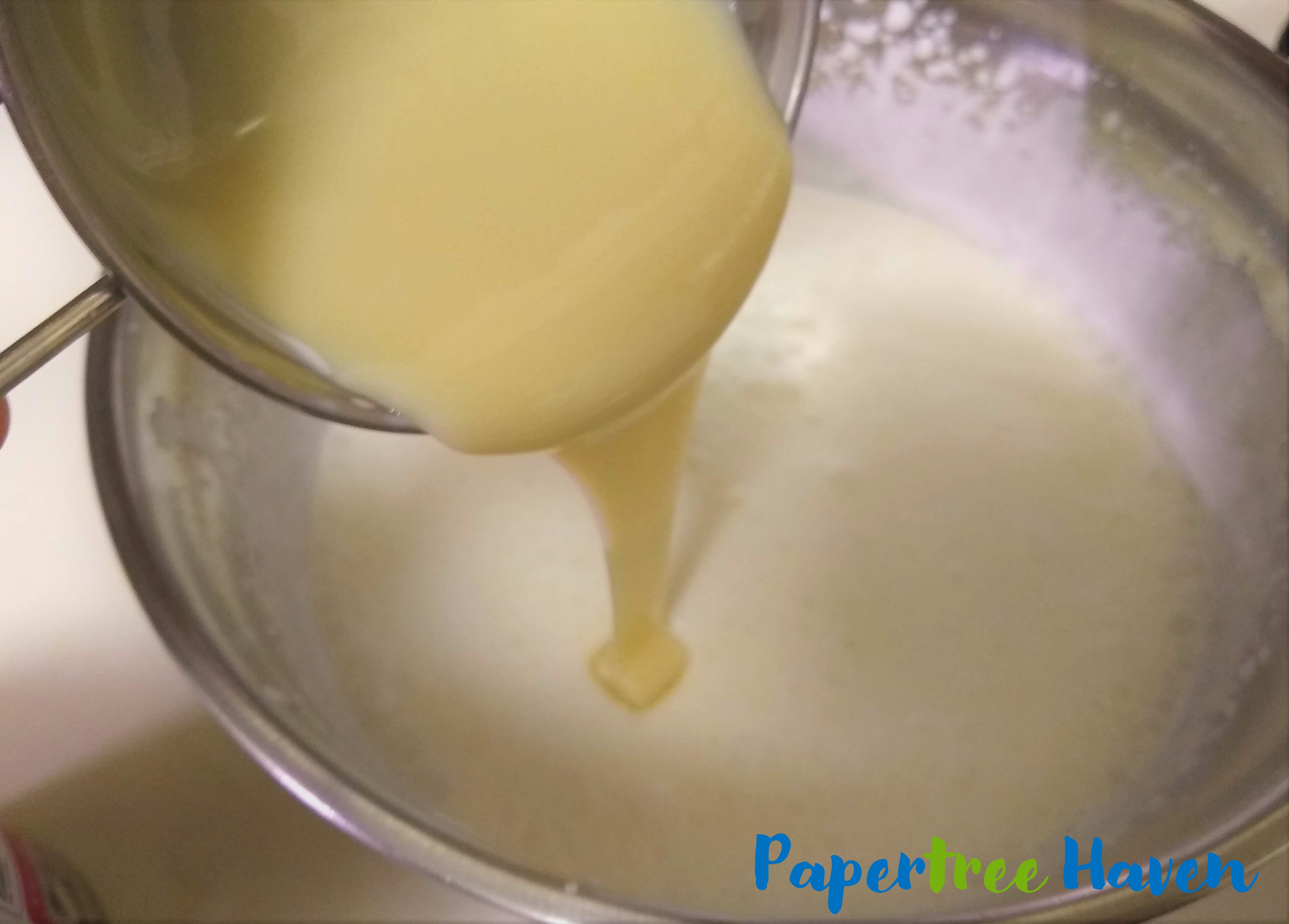 pour condensed milk in whipped cream to make home made ice cream