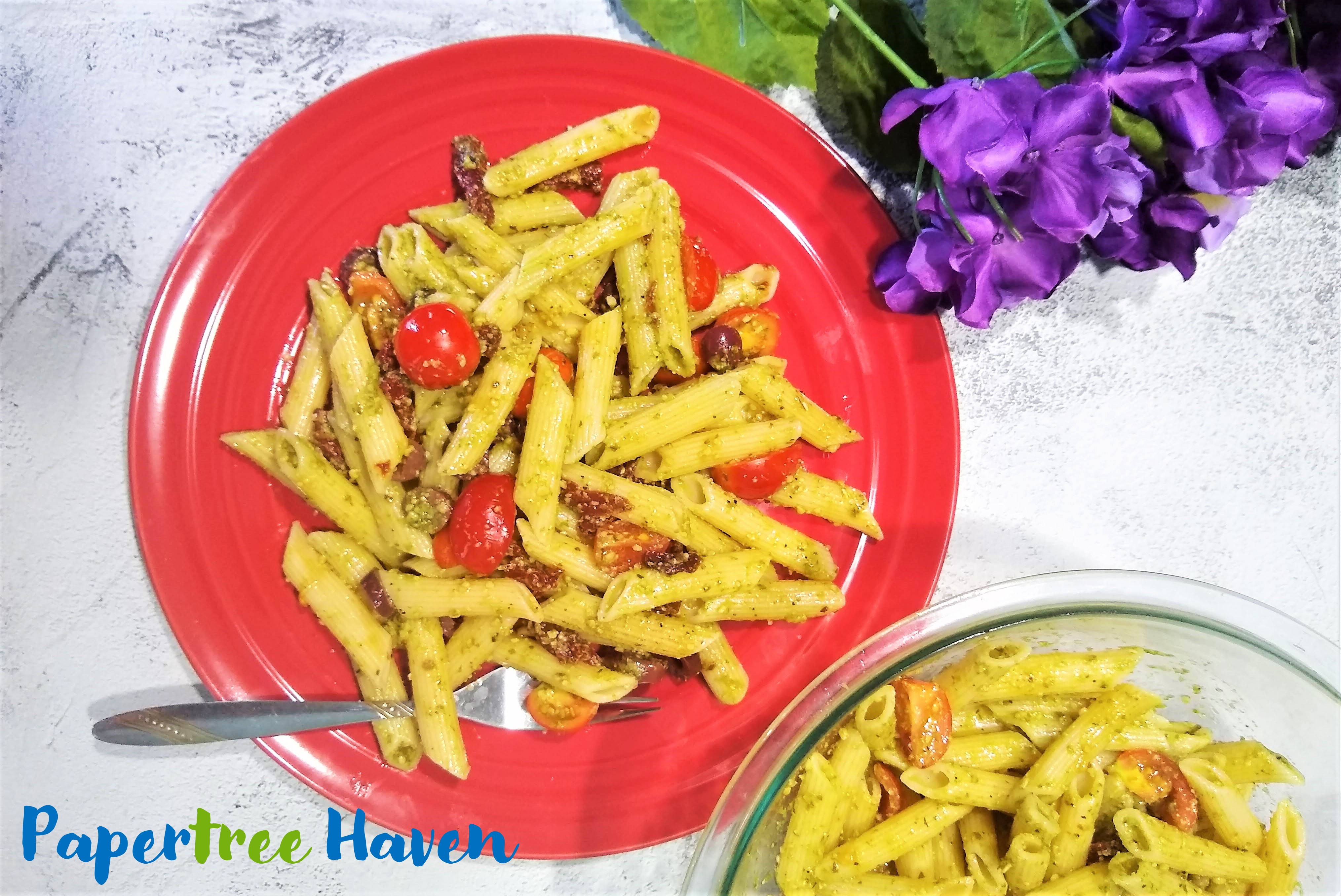 pesto pasta with olives and tomatoes